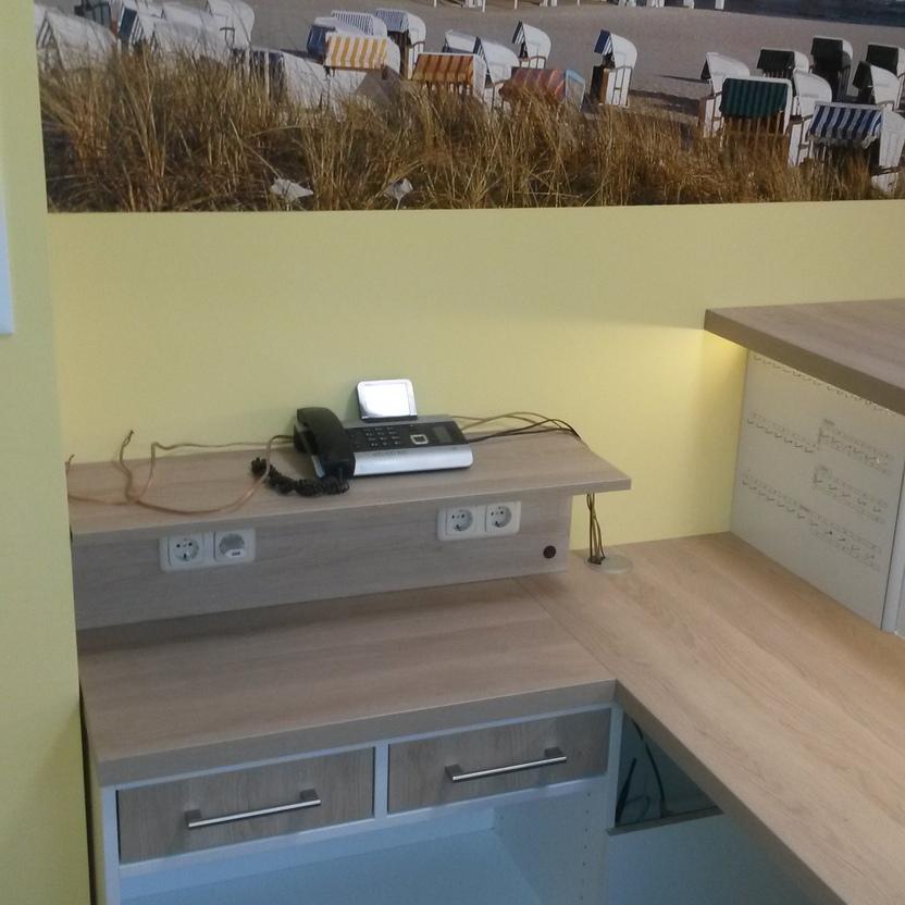 Telefonecke neben Empfangstresen Telefonecke neben Empfangstresen